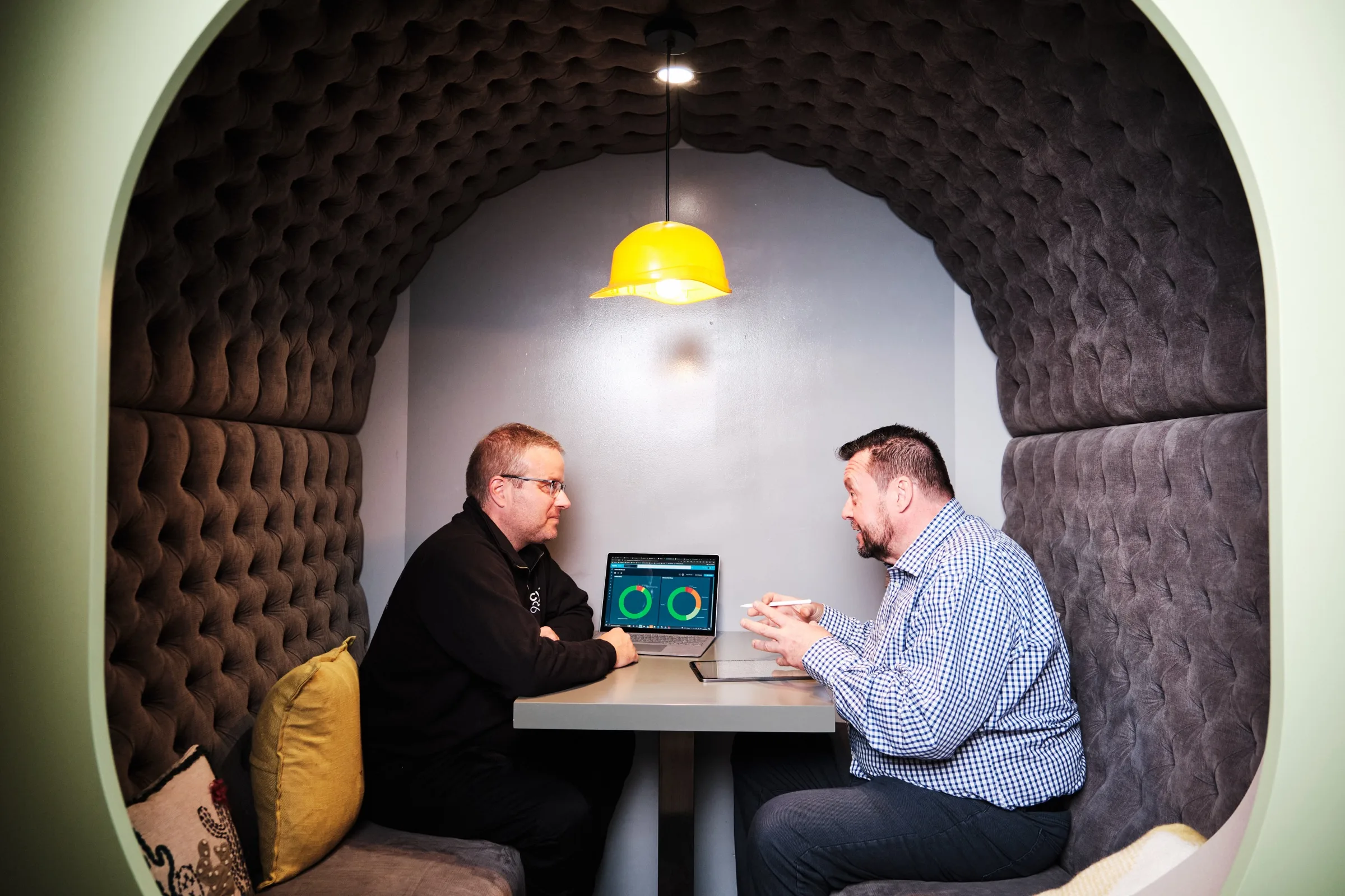 A CyberBITS engineer reviewing security alerts on screen